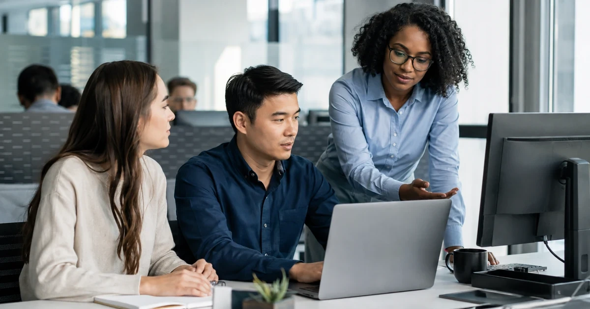 Information security analyst guiding employees on approved AI tools and appropriate business data handling