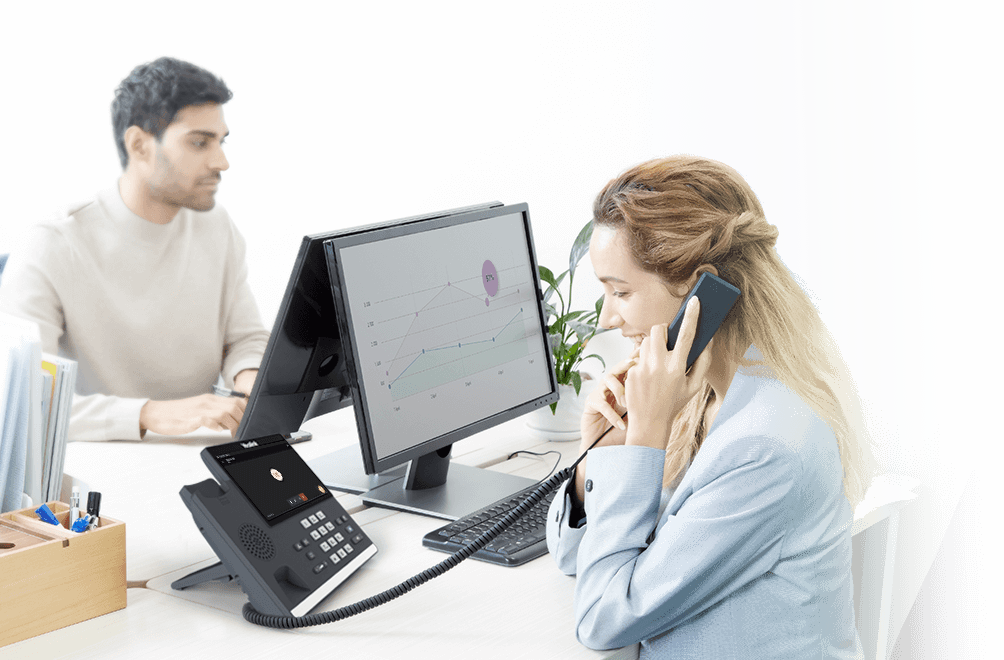 Yealink MP56 business desk phone in a professional office